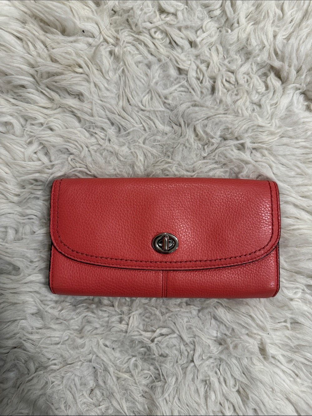 Coach Park Coralโ Pink Sienna
Pebble Leather Trifold Turnlock
Envelope Wallet